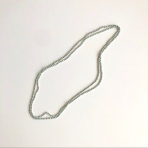 Long mint colored beaded necklace